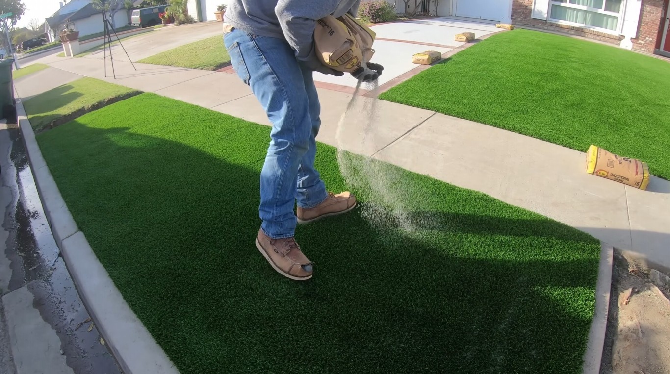 Eco-friendly artificial grass installation being cleaned in Richland, WA